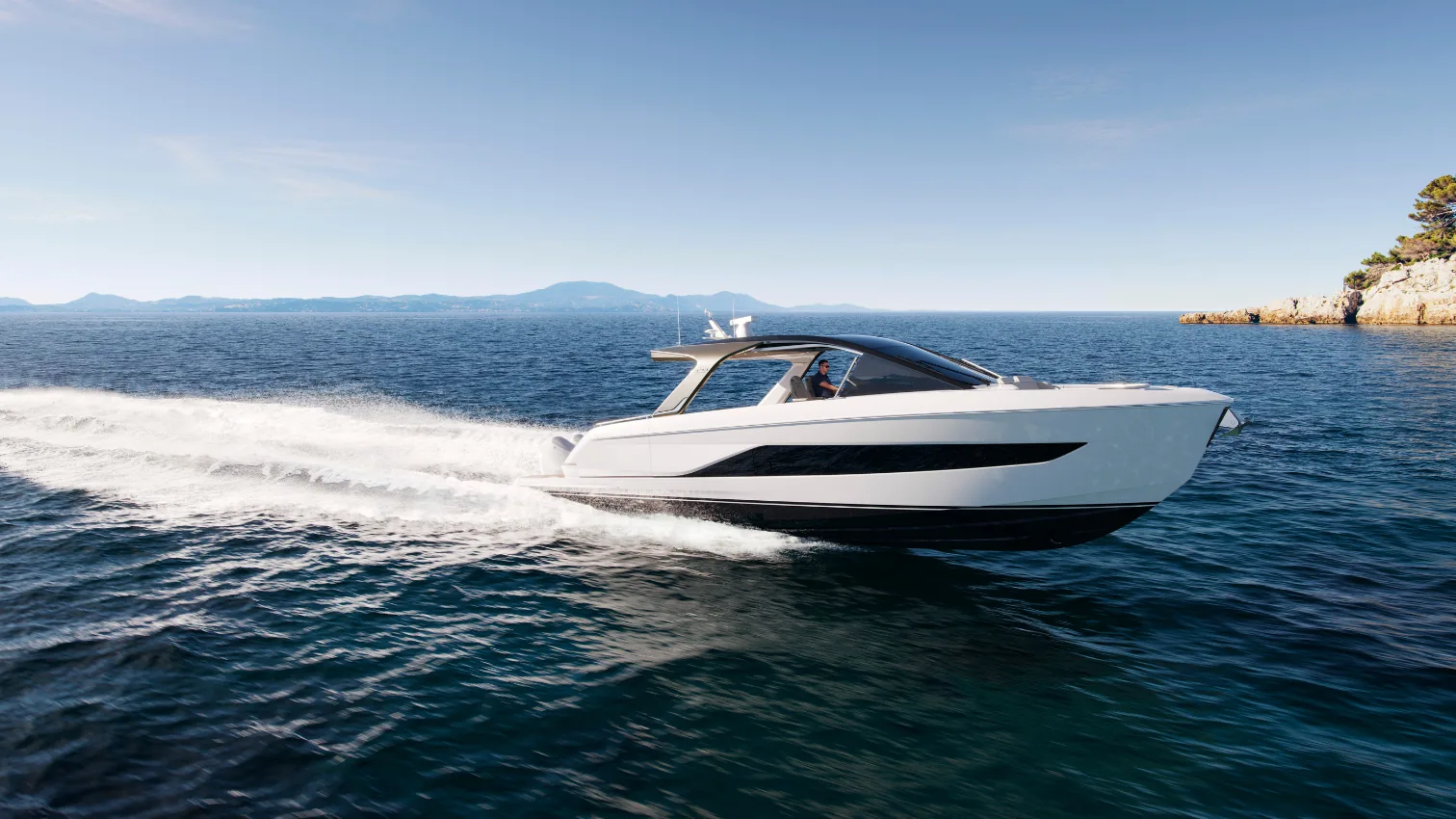 The Princess C48 Open running at speed on open water, full profile view.