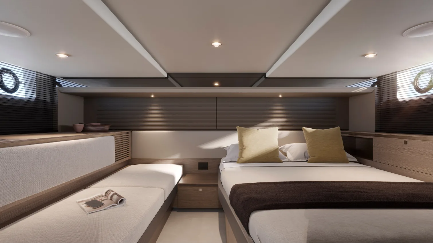 Princess C48 Open below-deck cabin with a double berth and single berth finished in light wood and neutral tones.